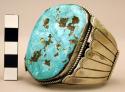 Cuff bracelet, silver with fine rope design and large central turquoise stone