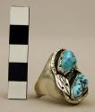 Ring, silver, 2 turquoise nuggets encircled by a silver snake