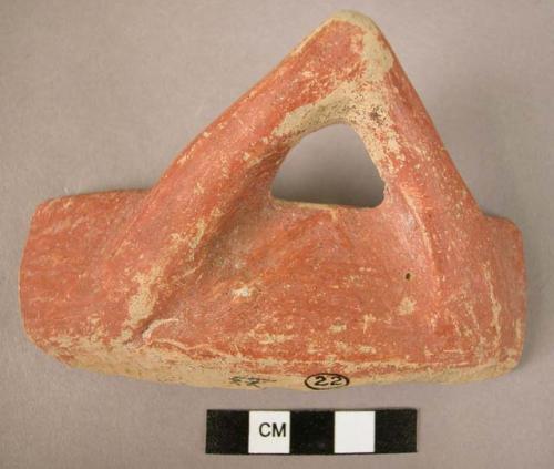 Ceramic bowl rim sherd, red slipped ext., white slipped int., V-shaped handle