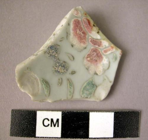 Base potsherd - floral relief on white glaze