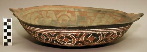 Earthenware dish with cord-impressed and polychrome designs on exterior and polychrome designs on interior