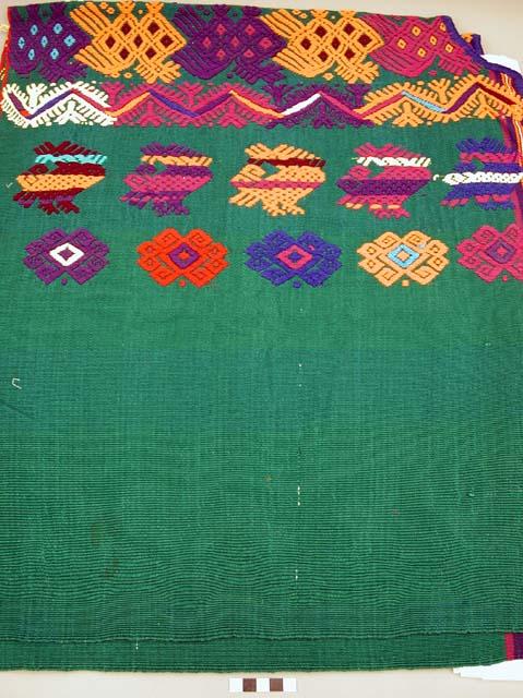 Green embroidered huipil