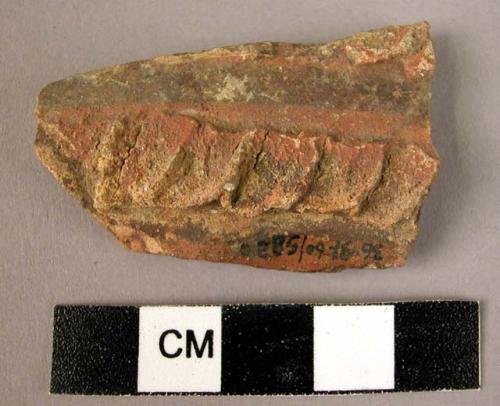 Potsherd - red painted and relief (B1)