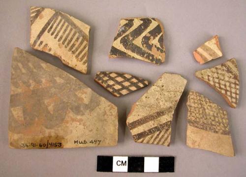 12 potsherds - painted on light, slipped (B1)