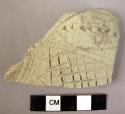 Potsherd - light colored, slipped, incised