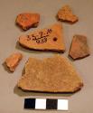 Red and black-on-red potsherds