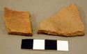 Red and black-on-red potsherds