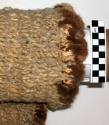 Blanket of goat's wool; kinbawas