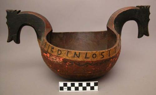 Wooden bowl, with two horse-head handles