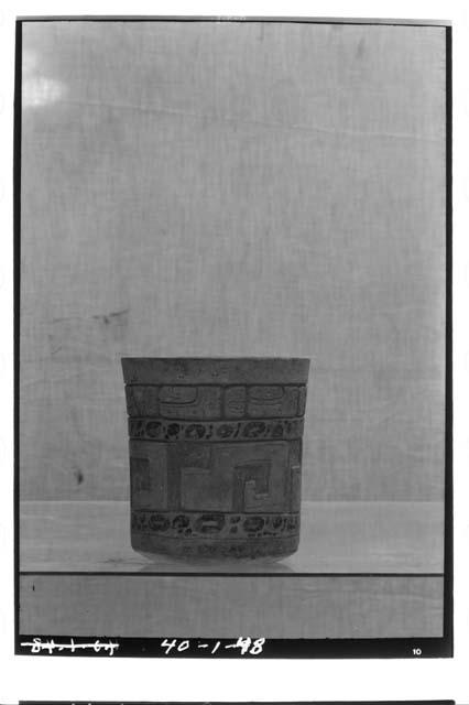 Covered cylindrical vase.  S.A.A. 100, Burial in tr. S. of Str. 24, Ht. 11.5 cm.