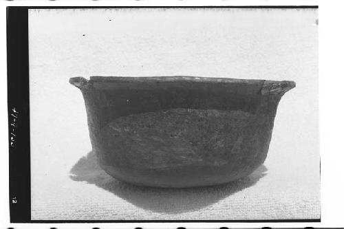 Red on brown ware bowl from burial