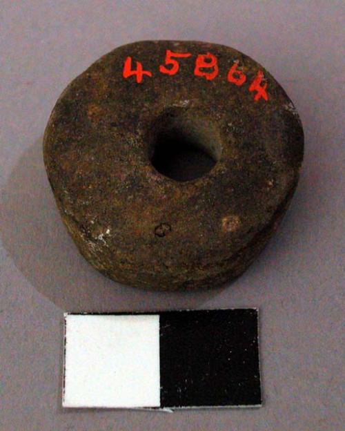 Spindle whorl, stone