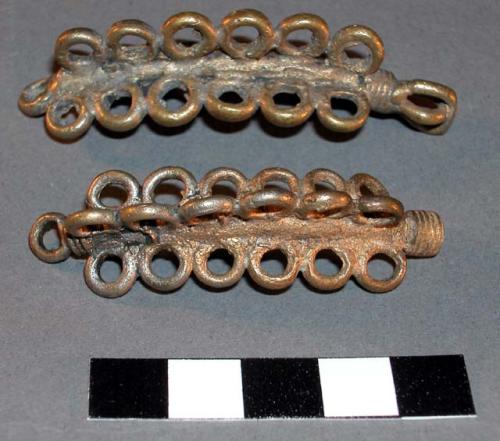 Cast brass or bronze ear(?) ornaments