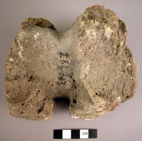 Volcanic stone hammer with handholds