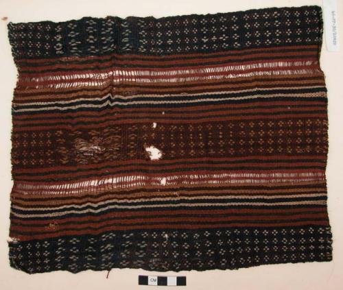 Textile, warp-patterned