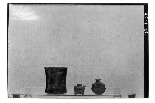 Cylindrical vases.  S.A.A. 128, Tomb III, Str. 24, Ht. 13.5.  Paint pot.