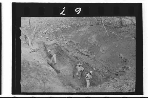 Workers excavating trench 4-46