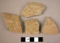 8 incised potsherds