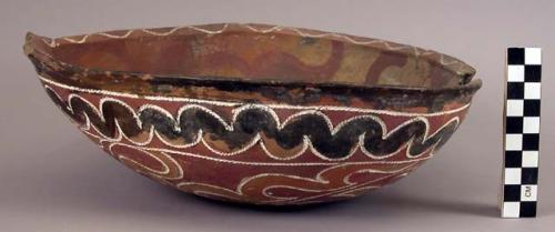 Ceramic, earthenware complete vessel, bowl, triangular shaped, polychrome slipped, and cord-impressed design