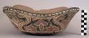Ceramic, earthenware complete vessel, bowl, squared rim, glass beads strung around rim, polychrome slipped interior and exterior, cord-impressed design; mended
