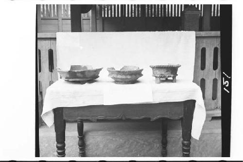 Three pottery vessels from tomb in ball court