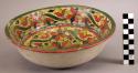 Ceramic bowl with polychrome floral designs on interior