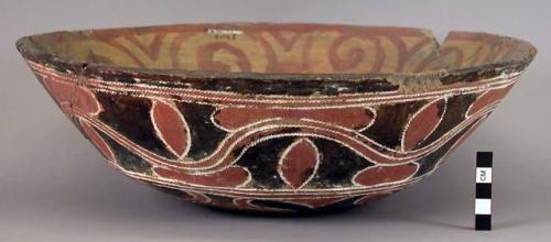 Ceramic, earthenware complete vessel, bowl, rounded base, polychrome slipped, cord-impressed design