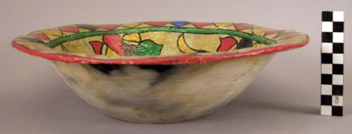 Earthenware bowl with polychrome designs on interior