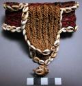 Arm band of woven fibers with tambu decoration