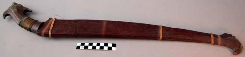 Sword, carved wooden handle and sheath