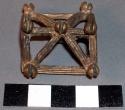 Cast brass or bronze buckle-like objects