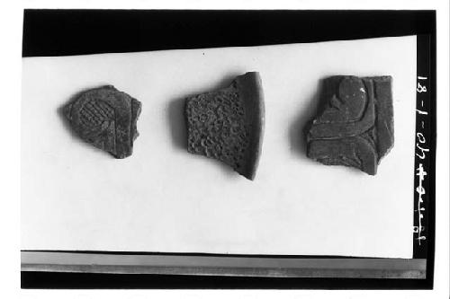 Sherds with surface modifications.