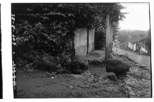 Three sculptured stones - Perhaps rabbits heads.