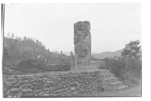 Stela 5 with west altar and altar X