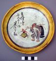Ceramic dish with painted monkey with pole