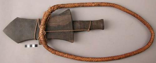 Native dagger in wooden sheath and rattan handle