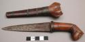Small dagger with carved wooden handle (tumbuk lada) - has damascened +