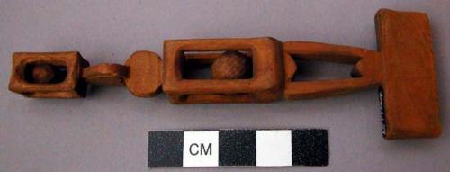 Ornament, carved wood, openwork cages with balls inside, knobbed, end bladed