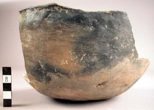 Part of plain pottery bowl