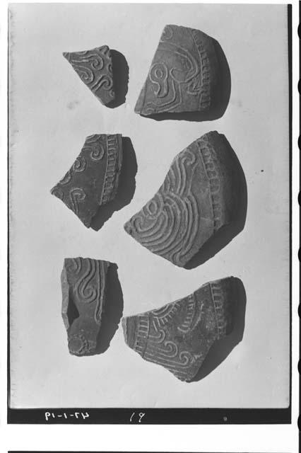 Plumbate sherds, mold-decorated on jar-shoulders