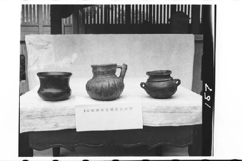 Three pottery vessels from tomb in ball court