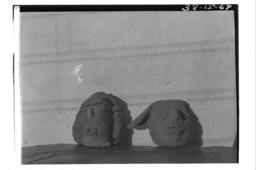 2 pottery heads in Jesuit Mission