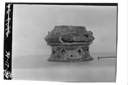 Incised bowl with double annular base, found with burial in test 6-39, cut 9.