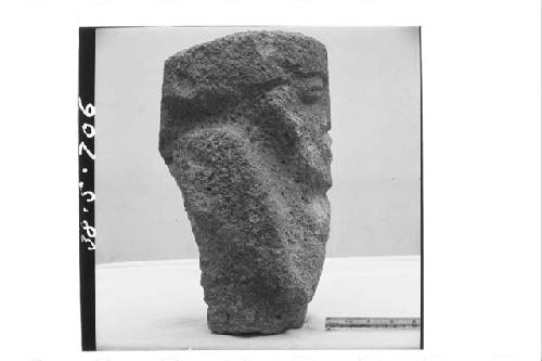 Right profile of stone figure