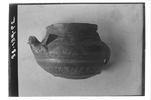 Red-on-orange effigy bowl. Field no. 36-23. Said to have been found in NE corner