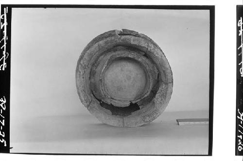 Base of incised bowl found with burial in test 6-39, cut 9.