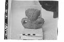 Head and Shoulders of Pottery Female (?) Figurine