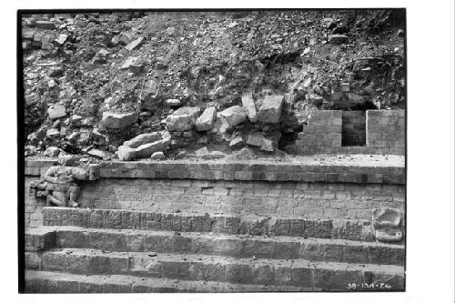 Fallen walls and capstones of Terrace wall of Str 11 and Reviewing Stand