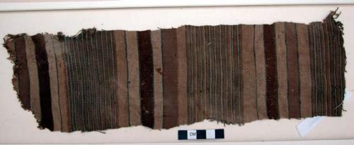 Organic, textile fragment, brown, blue, tan, multiple stripes