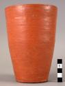 Ceramic, earthenware complete vessel, vase with tapered base, red slipped exterior